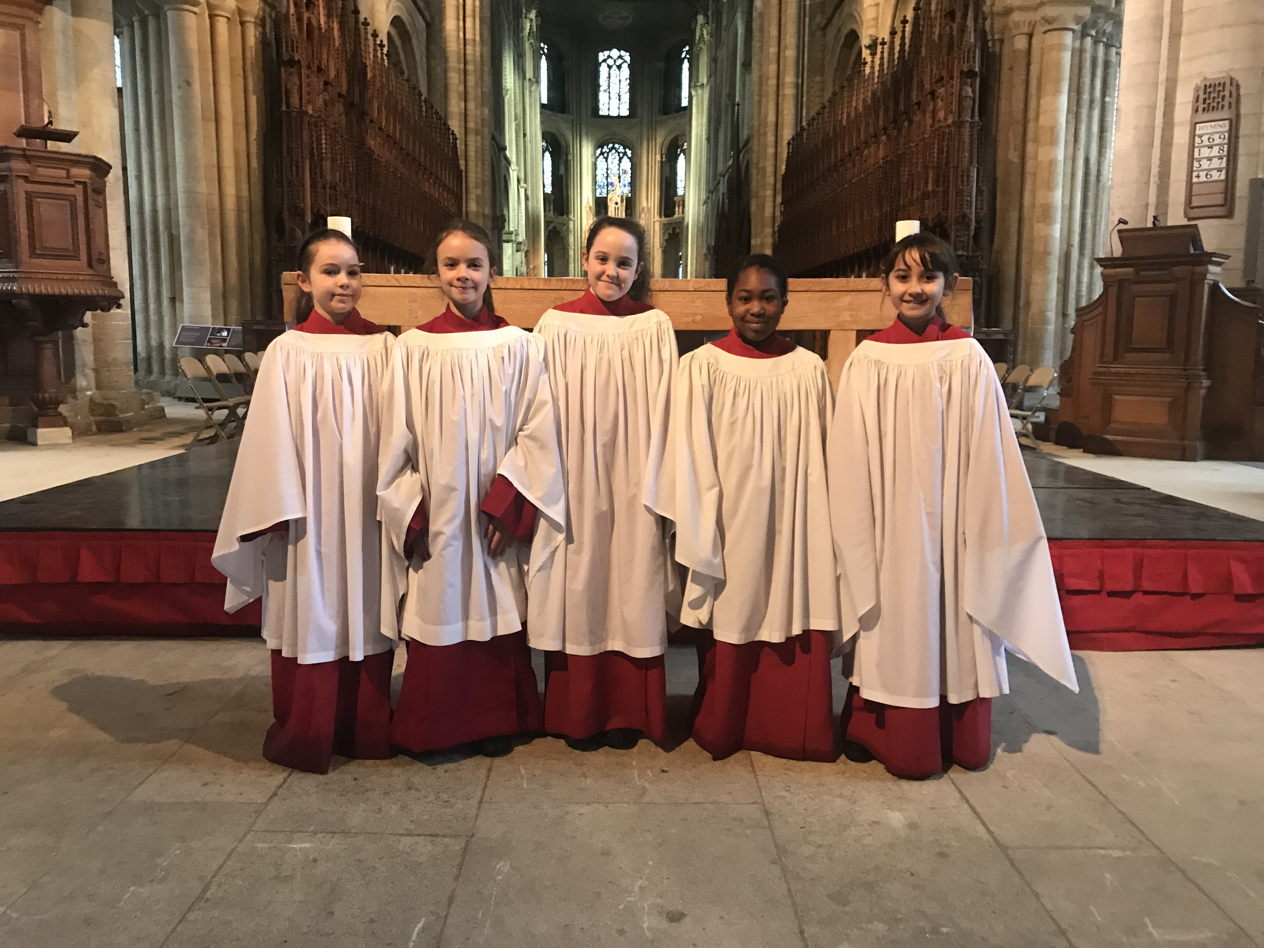 Girl choristers in their surplices